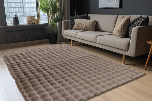 Hoogpolig vloerkleed Harmony – Taupe met zachte ribbelstructuur