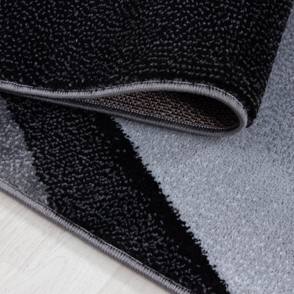 Plus Vloerkleed – Zwart/Antraciet – Golvend 3D Design – Laagpolig