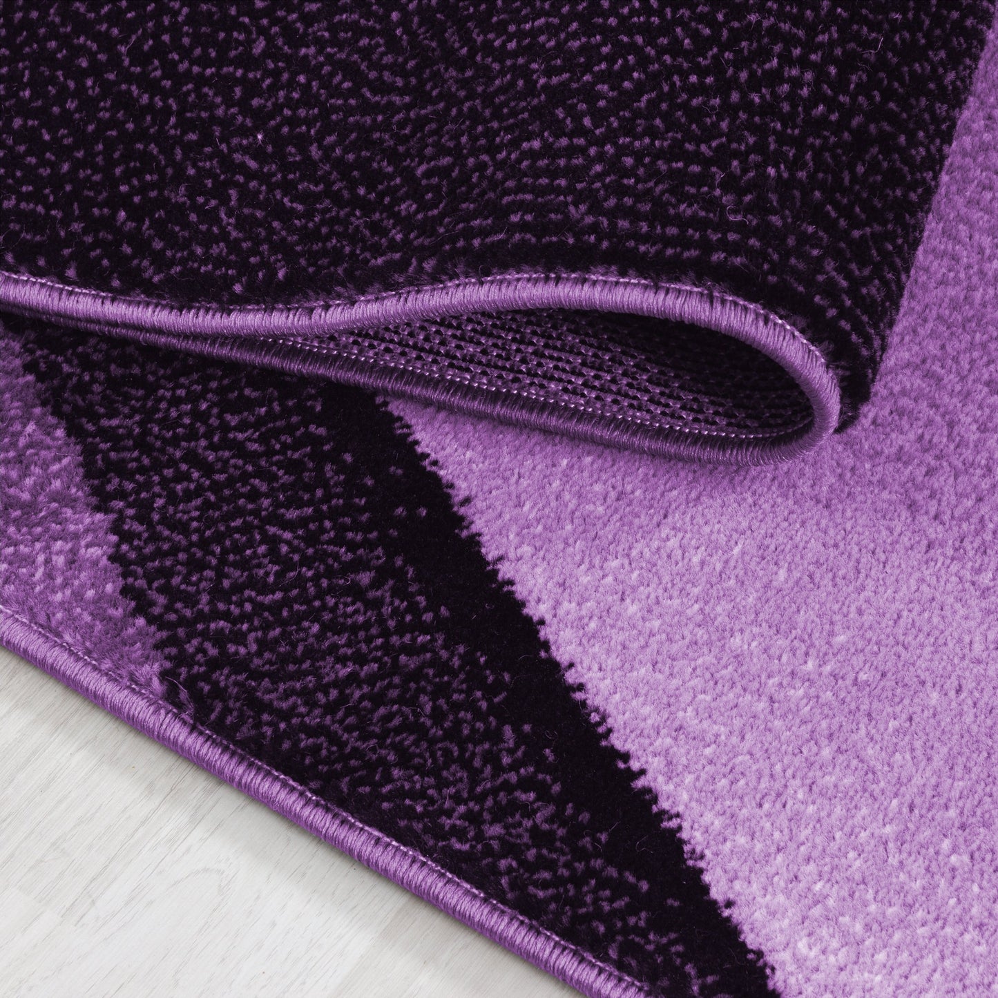 Plus Vloerkleed – Zwart/lila – Golvend 3D Design – Laagpolig