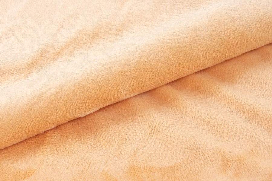 Plush deken – Perzik met zachte ribbelstructuur