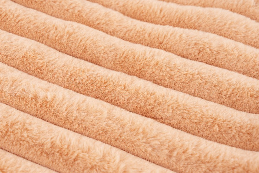 Plush deken – Perzik met zachte ribbelstructuur
